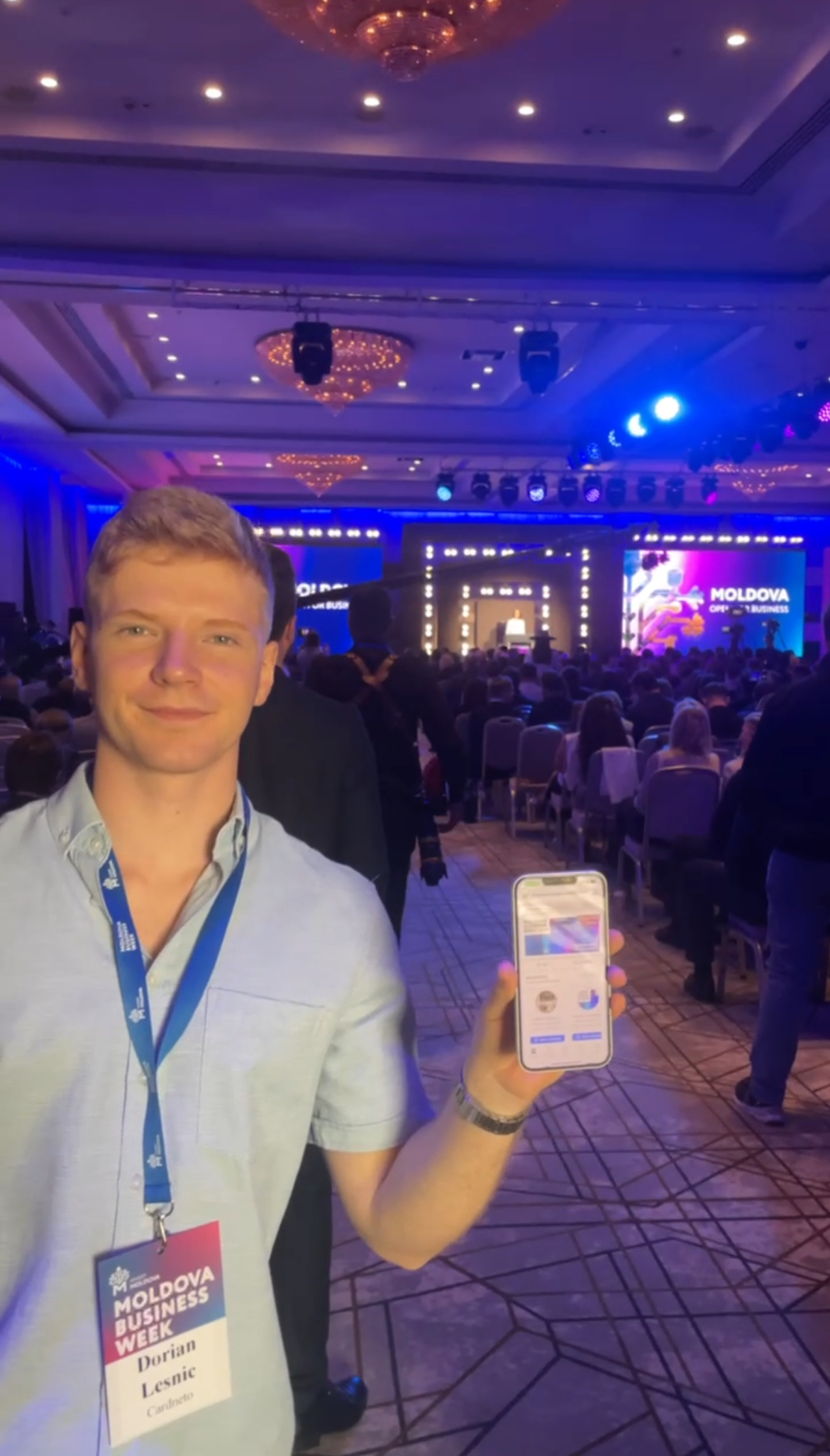 Attendee using the Cardneto networking app at Moldova Business Week